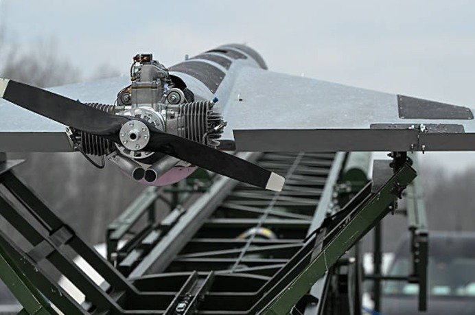 Propeller-driven UAV mounted on a rail launcher